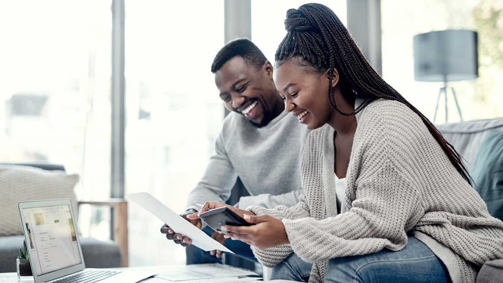 couple checking interest rates on mortgages